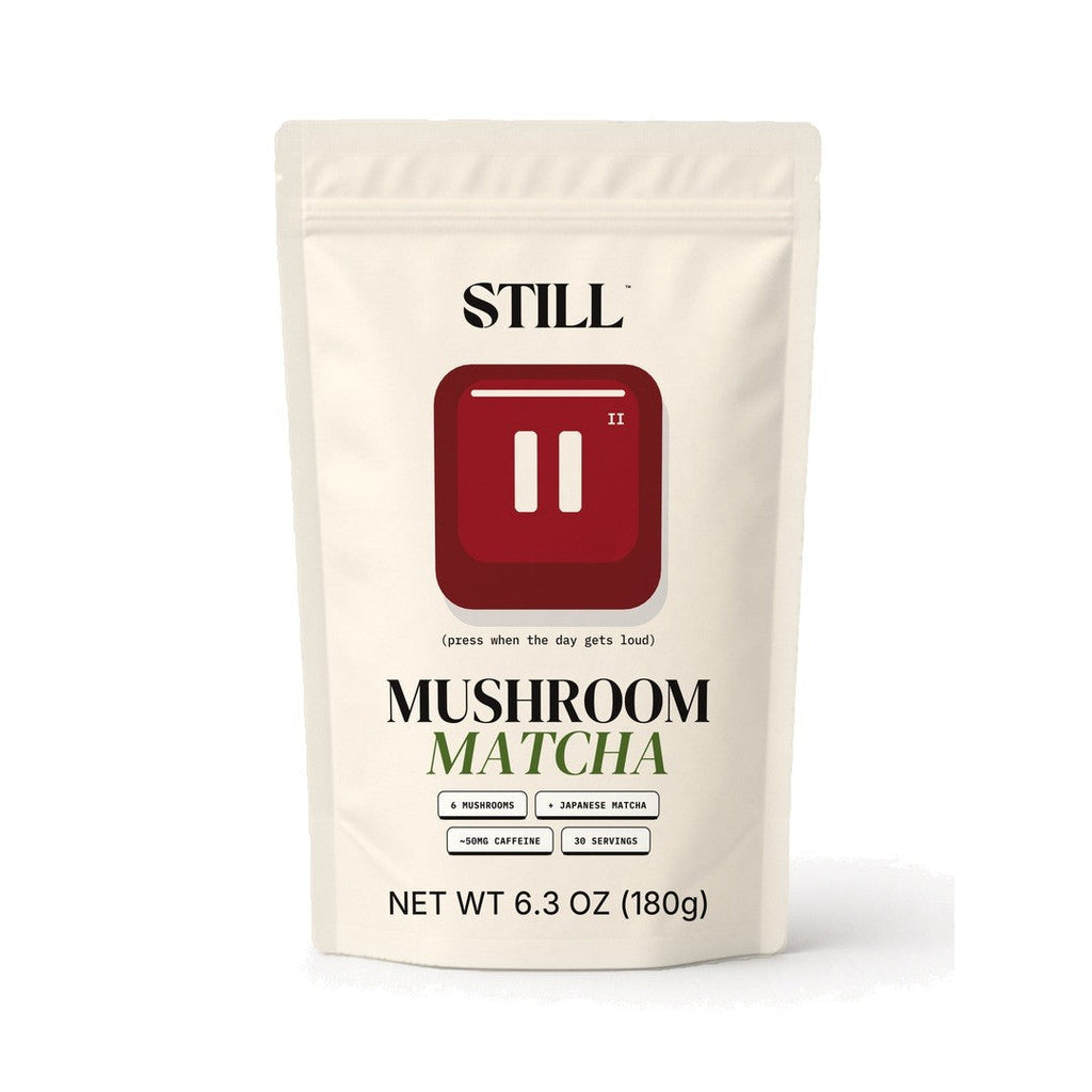 Front of the white STILL Mushroom Matcha pouch