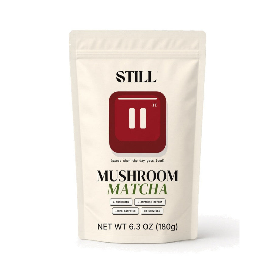 Front of the white STILL Mushroom Matcha pouch